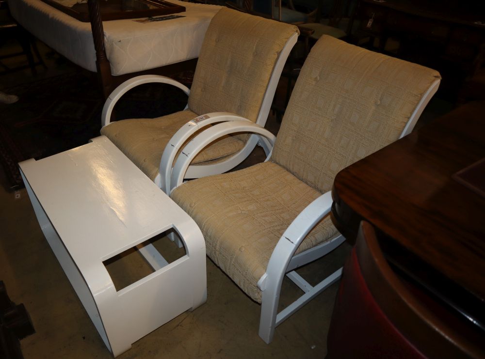 A pair of Art Deco style white painted bentwood armchairs and a matching coffee table